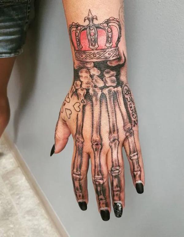 60 Skeleton Hand Tattoo Ideas with Meaning