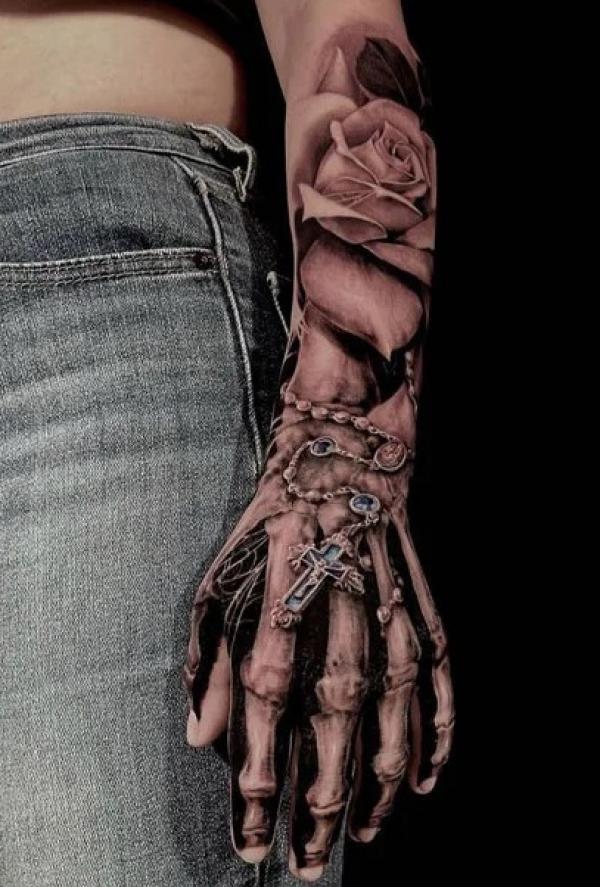 60 Skeleton Hand Tattoo Ideas with Meaning