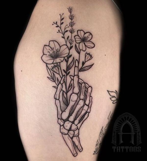 60 Skeleton Hand Tattoo Ideas with Meaning