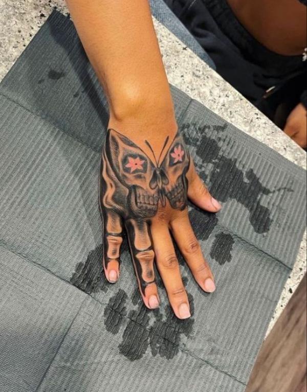 60 Skeleton Hand Tattoo Ideas with Meaning