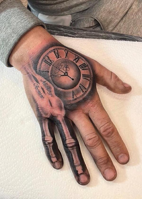 60 Skeleton Hand Tattoo Ideas with Meaning