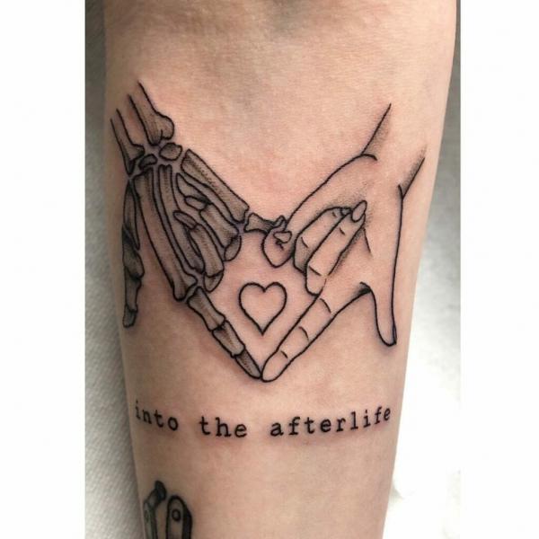 60 Skeleton Hand Tattoo Ideas with Meaning