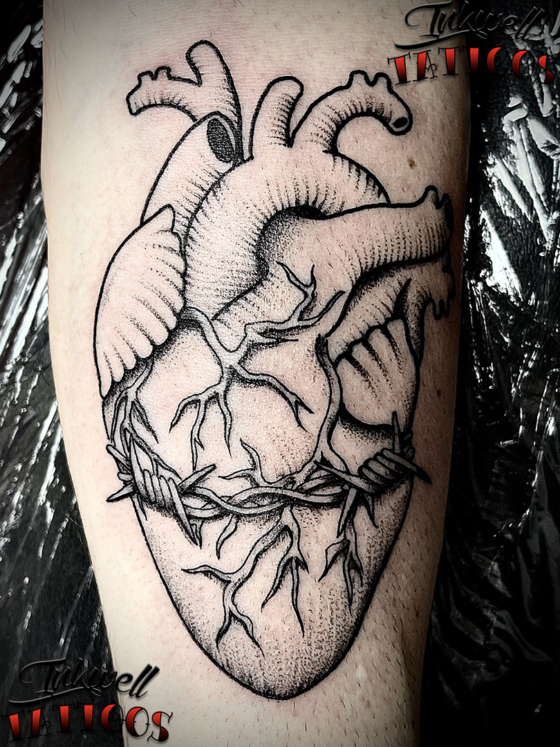 Barbed Wire Heart Tattoo: The Meaning and Designs