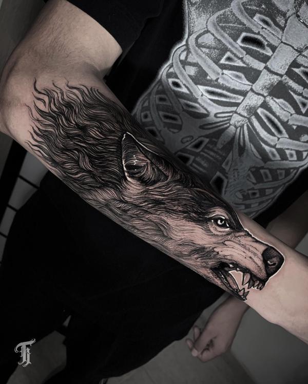Viking Fenrir Tattoo: Meaning and Designs