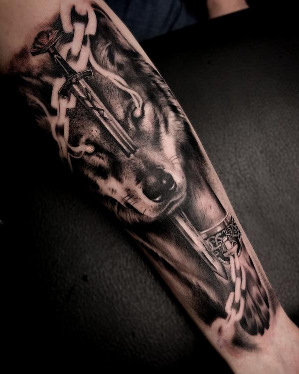 Viking Fenrir Tattoo: Meaning and Designs