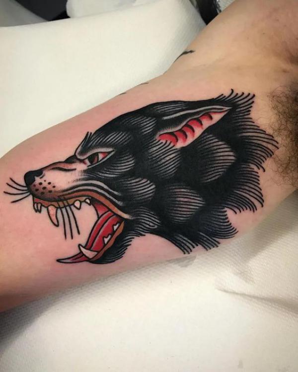 Viking Fenrir Tattoo: Meaning and Designs