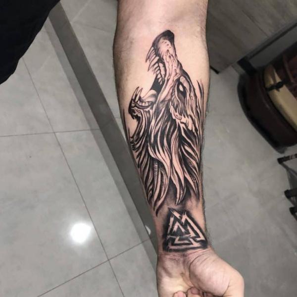 Viking Fenrir Tattoo: Meaning and Designs