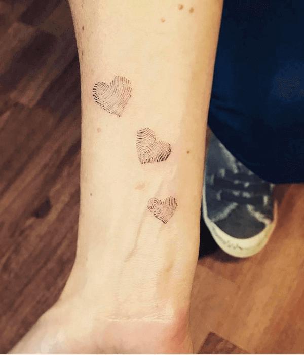 Fingerprint Heart Tattoo: Meaning and Designs
