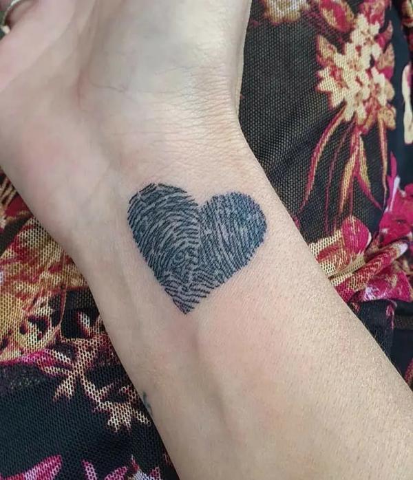 Fingerprint Heart Tattoo: Meaning and Designs