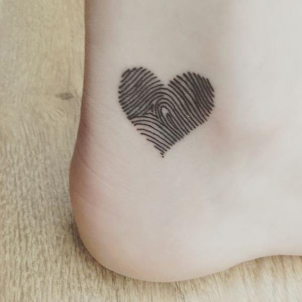 Fingerprint Heart Tattoo: Meaning and Designs