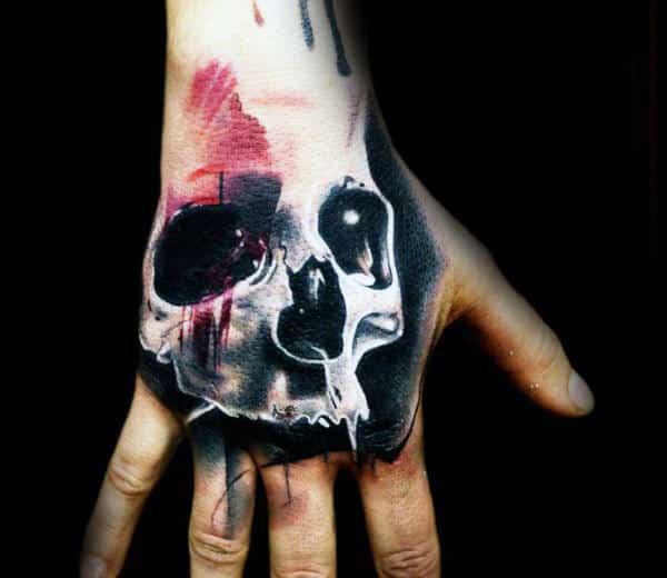 50 Skull Hand Tattoo Designs with Meaning