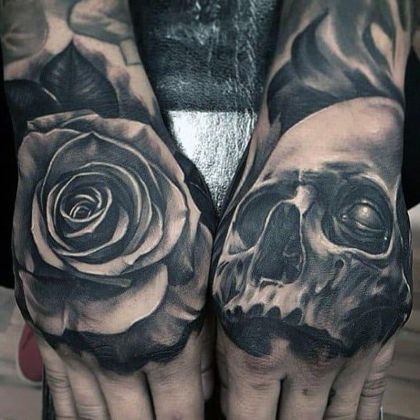 50 Skull Hand Tattoo Designs with Meaning