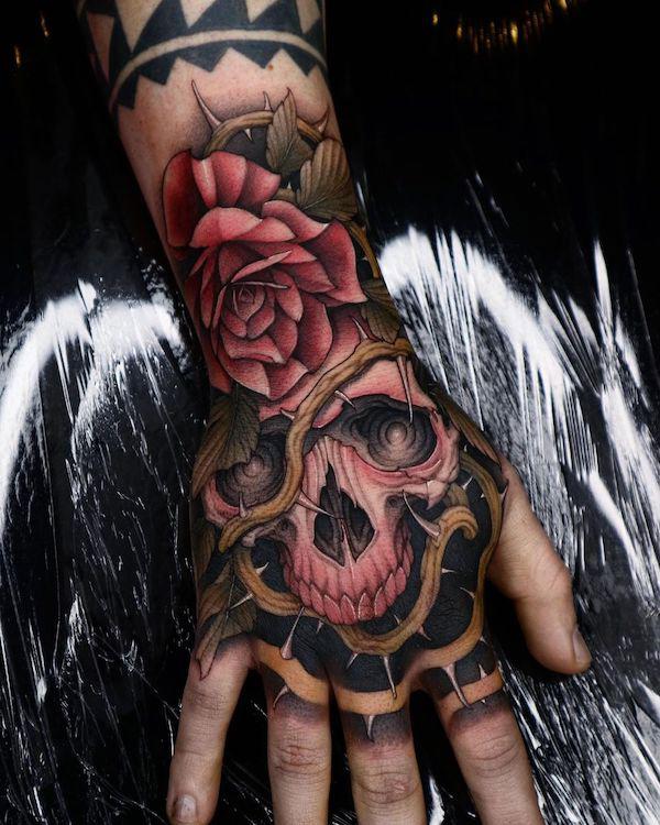 50 Skull Hand Tattoo Designs with Meaning
