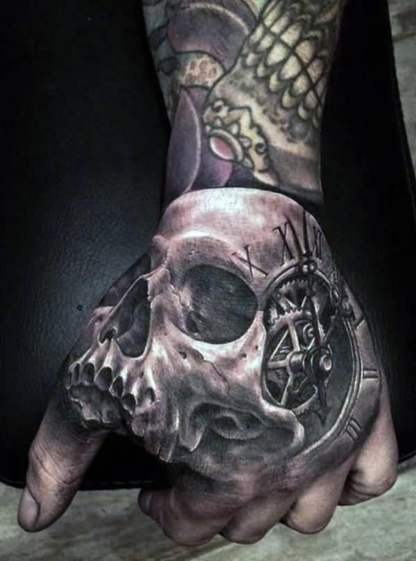 50 Skull Hand Tattoo Designs with Meaning