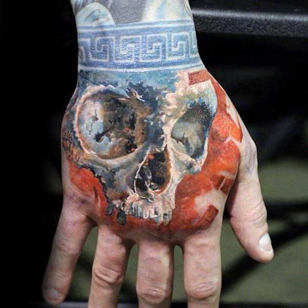 50 Skull Hand Tattoo Designs with Meaning