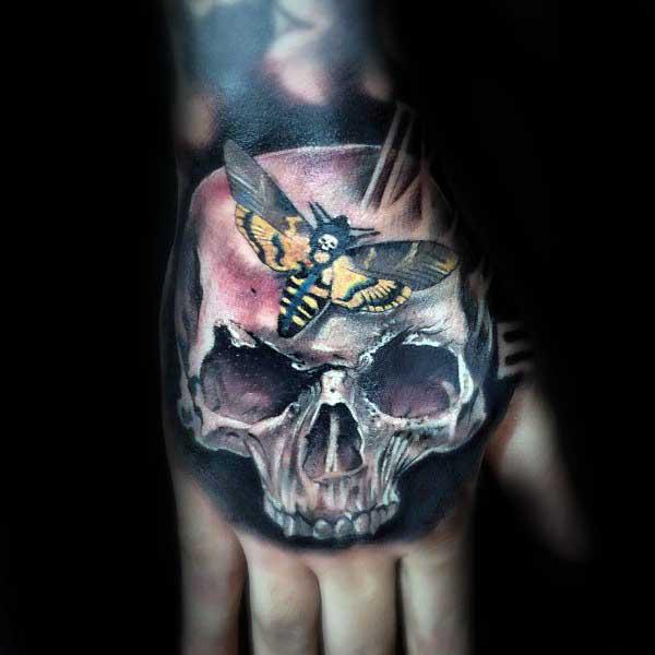 50 Skull Hand Tattoo Designs with Meaning