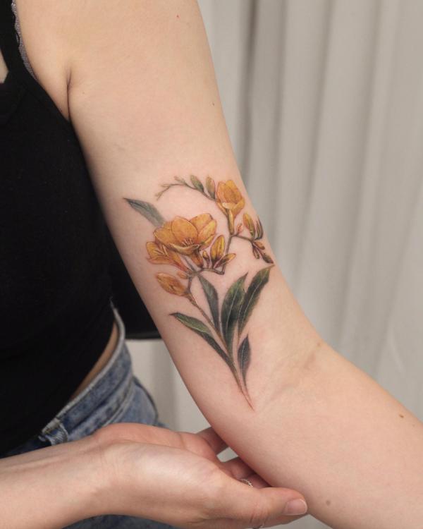 Freesia Tattoo: Unfolding the Meaning and Designs