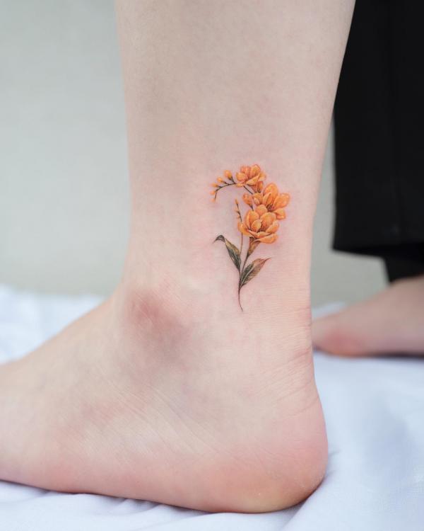 Freesia Tattoo: Unfolding the Meaning and Designs