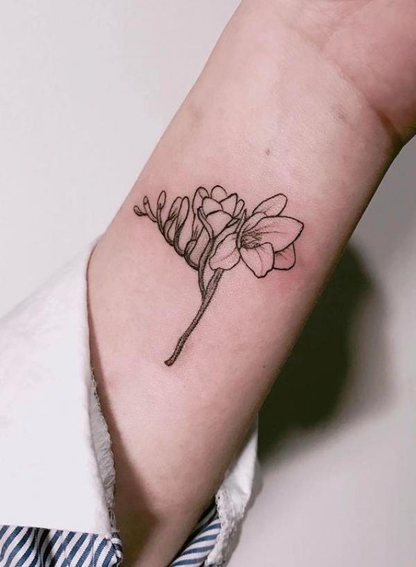 Freesia Tattoo: Unfolding the Meaning and Designs