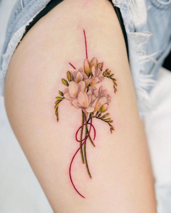 Freesia Tattoo: Unfolding the Meaning and Designs