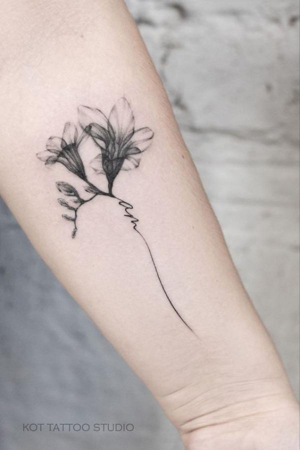 Freesia Tattoo: Unfolding the Meaning and Designs