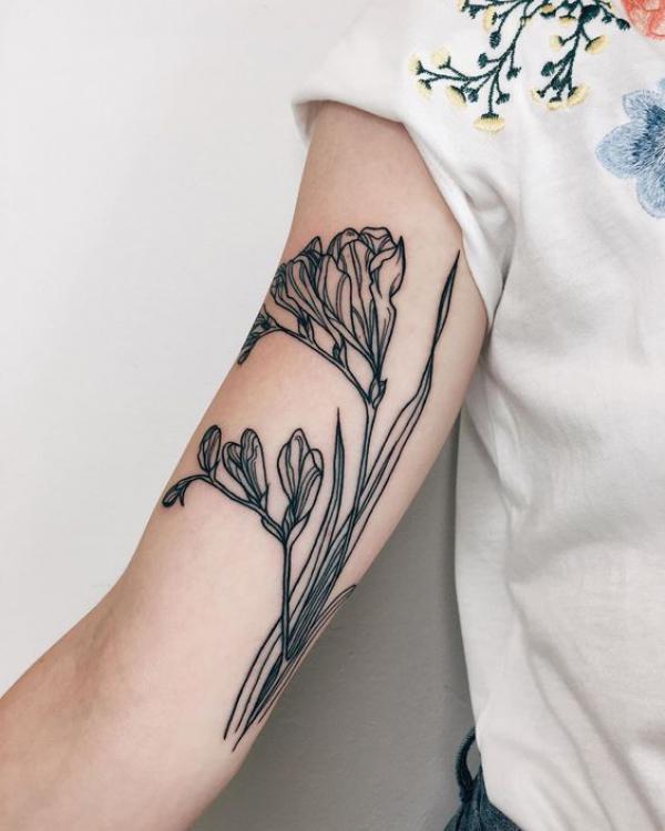 Freesia Tattoo: Unfolding the Meaning and Designs