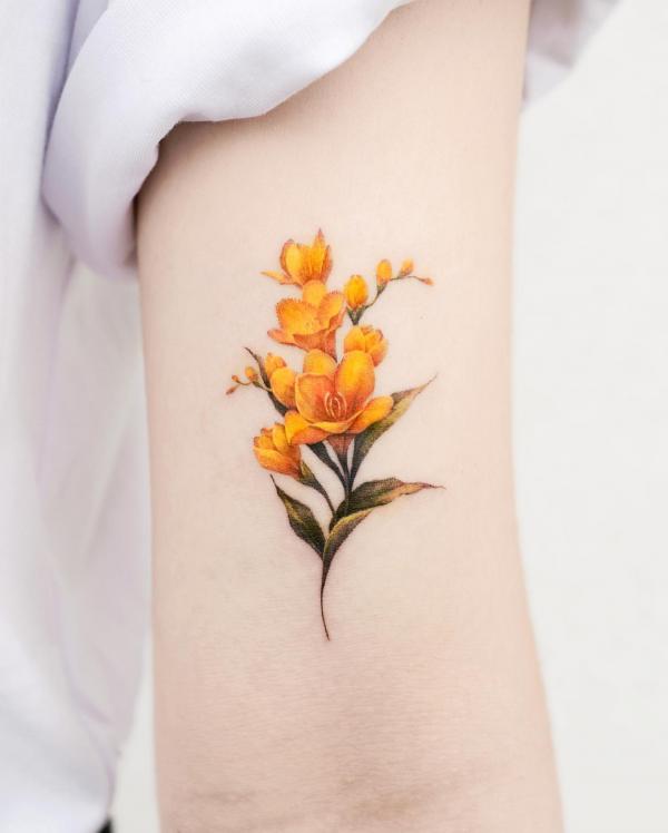 Freesia Tattoo: Unfolding the Meaning and Designs
