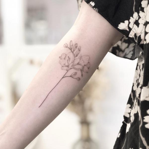 Freesia Tattoo: Unfolding the Meaning and Designs