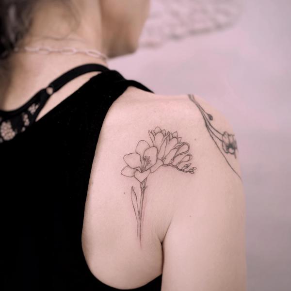 Freesia Tattoo: Unfolding the Meaning and Designs