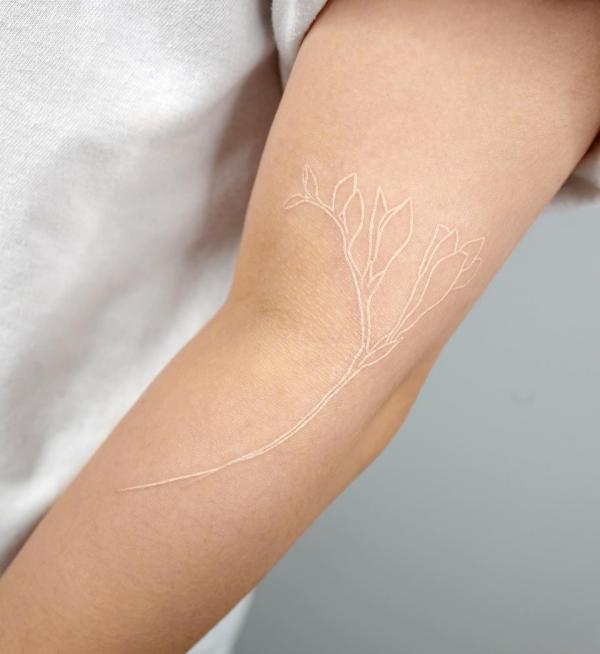 Freesia Tattoo: Unfolding the Meaning and Designs