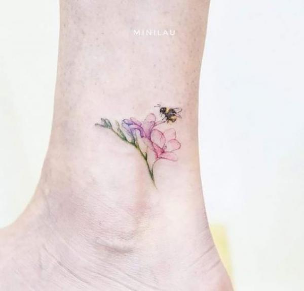 Freesia Tattoo: Unfolding the Meaning and Designs