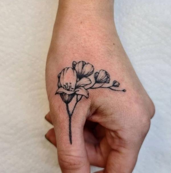 Freesia Tattoo: Unfolding the Meaning and Designs