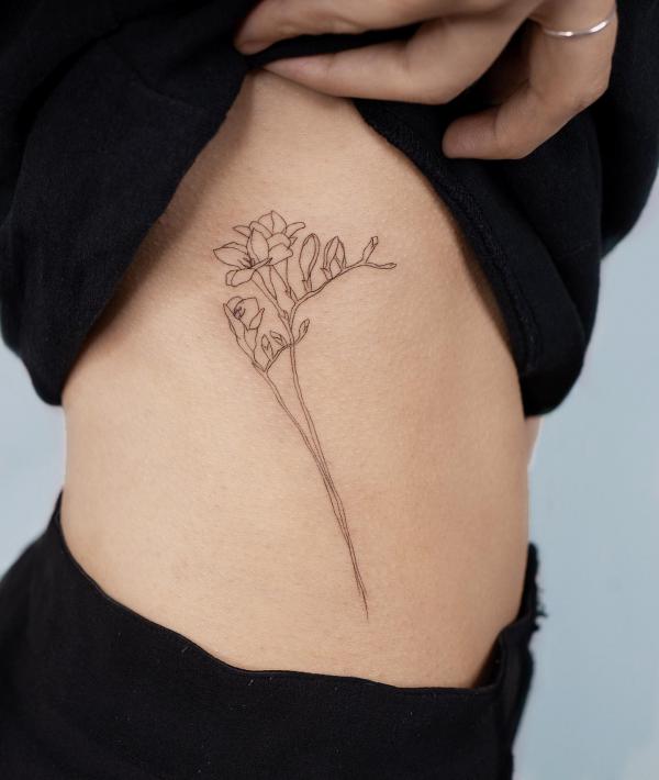 Freesia Tattoo: Unfolding the Meaning and Designs