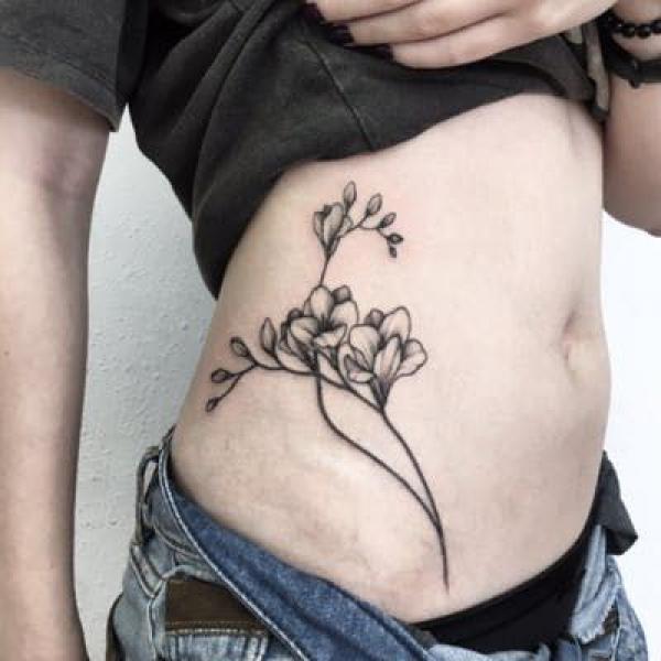 Freesia Tattoo: Unfolding the Meaning and Designs
