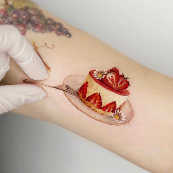 Strawberry Tattoo: Artistic Blend of Beauty and Meaning