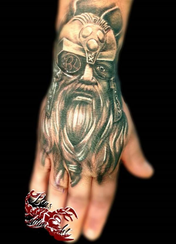 Odin Tattoo: Symbolism and Designs