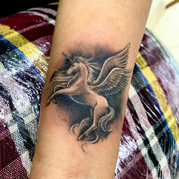 40 Inspiring Unicorn Tattoos with Meaning