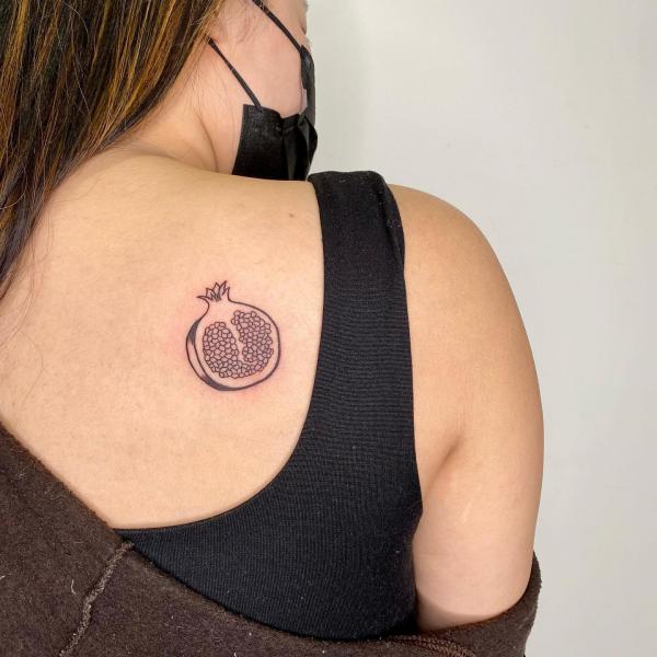 Pomegranate Tattoo: Exploring Its Symbolism and Designs