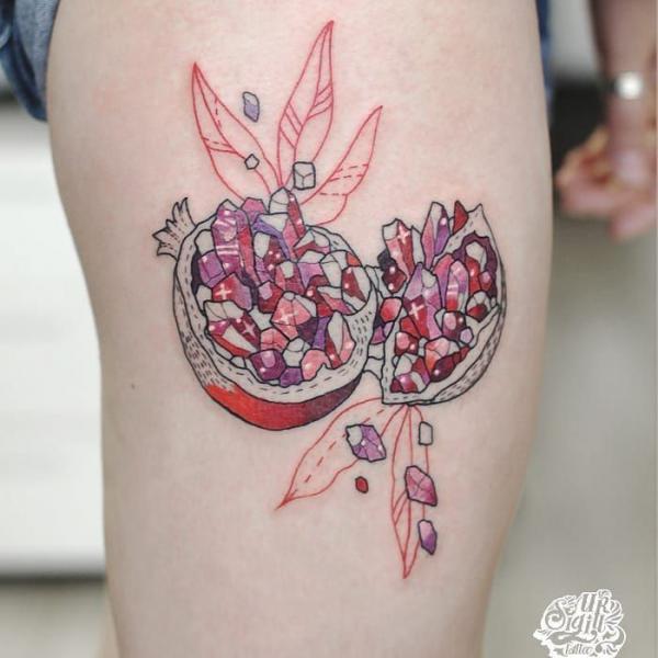 Pomegranate Tattoo: Exploring Its Symbolism and Designs