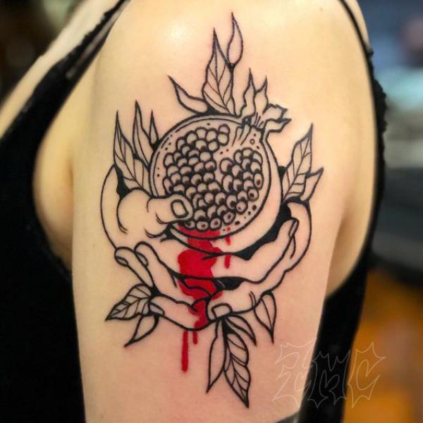 Pomegranate Tattoo: Exploring Its Symbolism and Designs