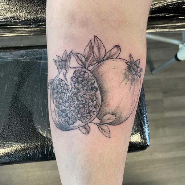 Pomegranate Tattoo: Exploring Its Symbolism and Designs