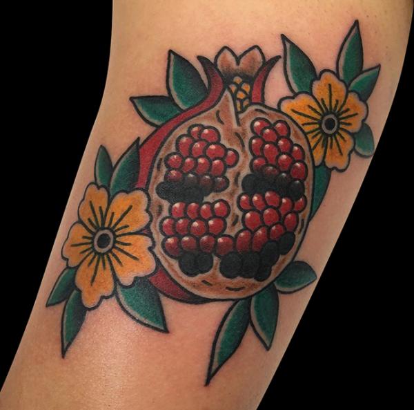 Pomegranate Tattoo: Exploring Its Symbolism and Designs