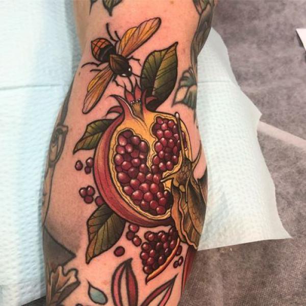 Pomegranate Tattoo: Exploring Its Symbolism and Designs