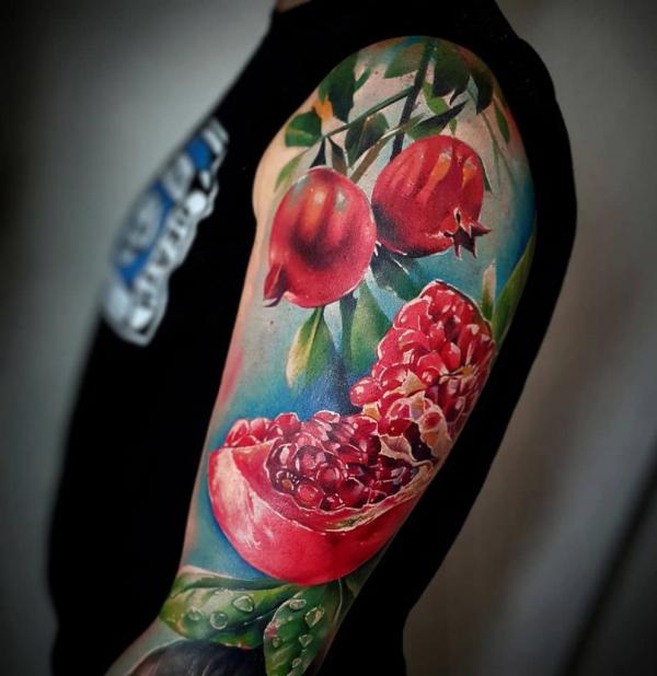 Pomegranate Tattoo: Exploring Its Symbolism and Designs
