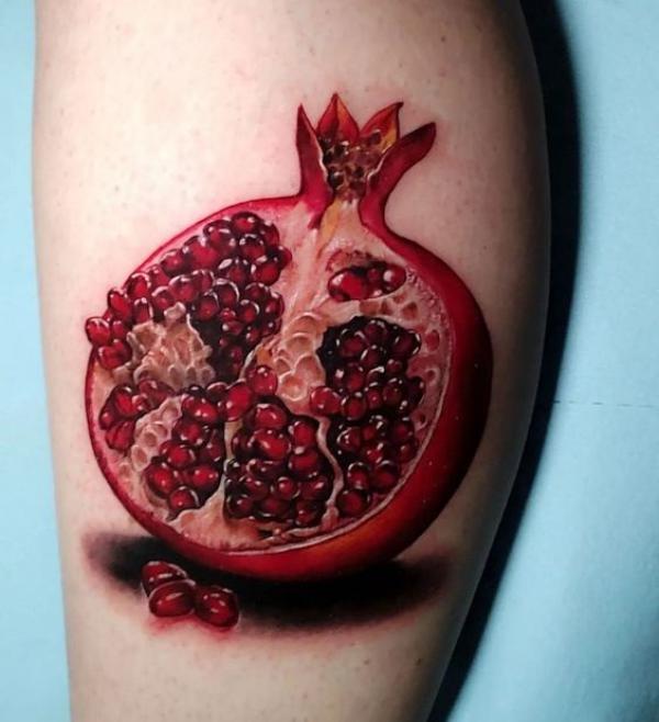 Pomegranate Tattoo: Exploring Its Symbolism and Designs