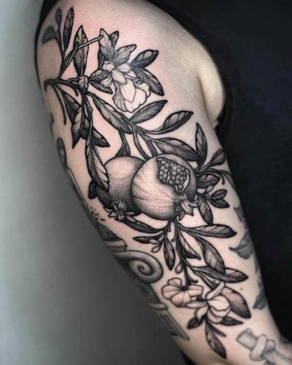 Pomegranate Tattoo: Exploring Its Symbolism and Designs