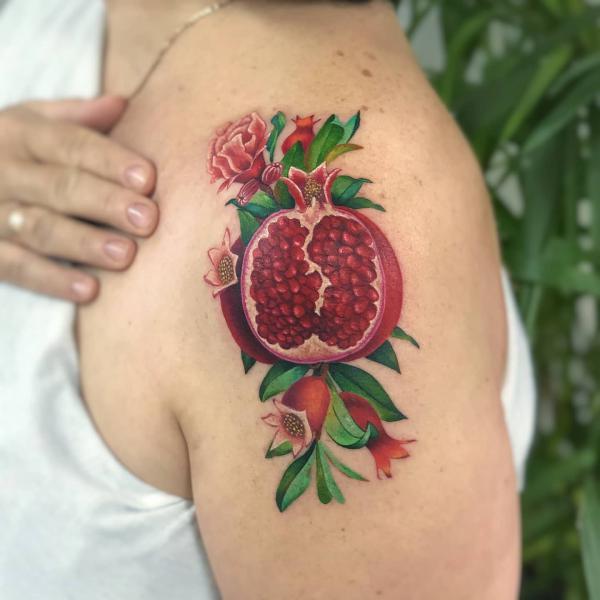 Pomegranate Tattoo: Exploring Its Symbolism and Designs