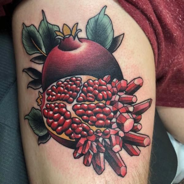 Pomegranate Tattoo: Exploring Its Symbolism and Designs