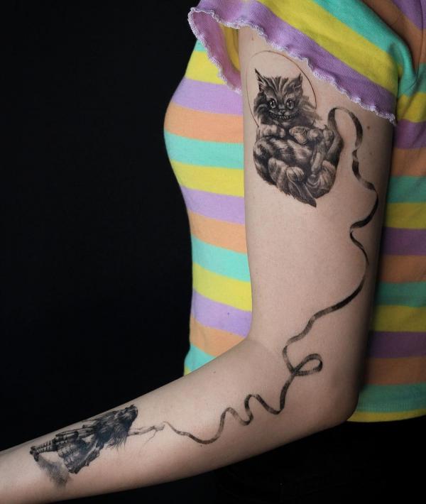 Cheshire Cat Tattoo Designs: A Journey into Wonderland