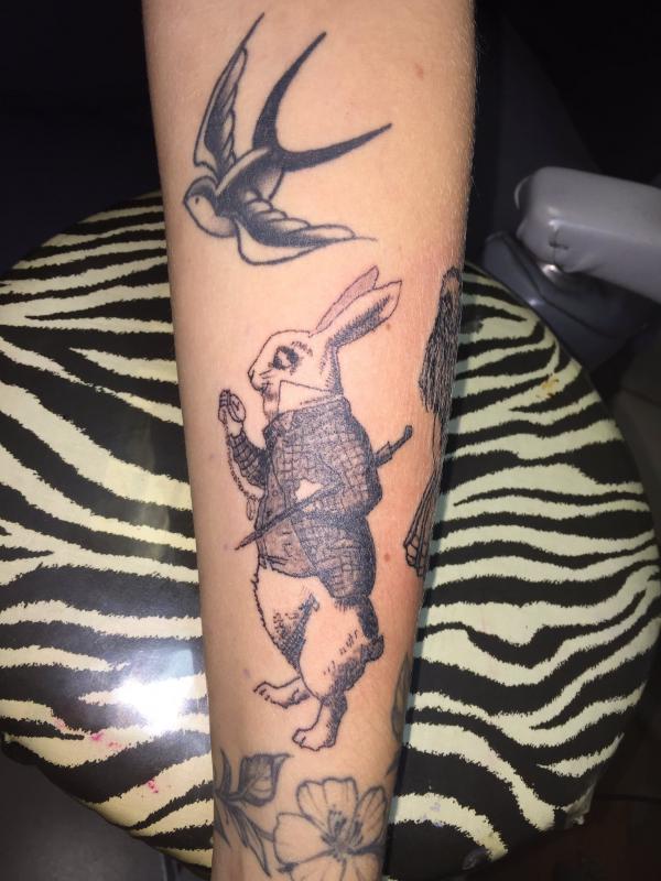 The White Rabbit Tattoo: Symbolism, Design, and Inspiration
